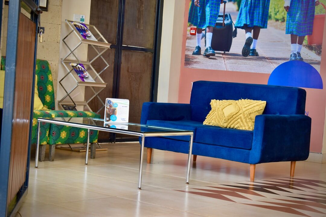 Modern corporate podcast studio lounge area with comfortable seating