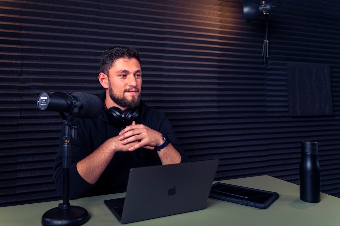 employee listening to podcast